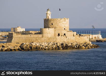 Fortress in the sea, Mandraki Harbor, Rhodes, Dodecanese Islands, Greece