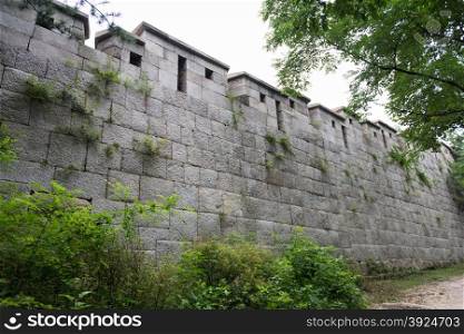 Fortress wall of Seoul. Fortress wall north of Seoul in South Korea with big stone quaders
