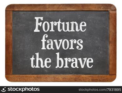 Fortune favors the brave - motivational words on a vintage slate blackboard