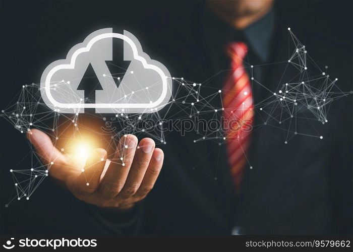 Forward-thinking businessman holds the cloud computing icon, emphasizing the future of cloud technology. Efficient data transfer and scalable online storage for business network on the internet.