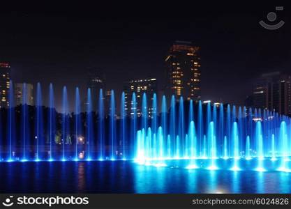Fountain at night in Kuala Lumpur. Illuminated fountain at night in modern city Kuala Lumpur