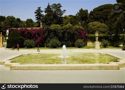 Fountain in a garden, Parc Guell, Barcelona, Spain