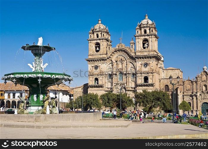 Fountain in front of a church, La Compania, Plaza-De-Armas, Cuzco, Peru