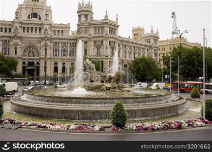 Fountain in front of a government building, Cibeles Fountain, Palacio De Comunicaciones, Plaza de Cibeles, Madrid, Spain