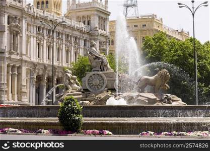 Fountain in front of a government building, Cibeles Fountain, Plaza de Cibeles, Palacio De Comunicaciones, Madrid, Spain