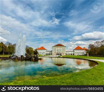 Fountain in Grand Parterre Baroque garden and the rear view of the Nymphenburg Palace. Munich, Bavaria, Germany