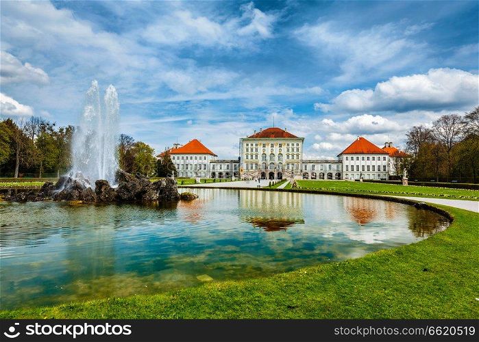 Fountain in Grand Parterre (Baroque garden) and the rear view of the Nymphenburg Palace. Munich, Bavaria, Germany. Nymphenburg Palace. Munich, Germany