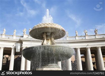Fountain in Saint Peter square in Rome, horizontal image