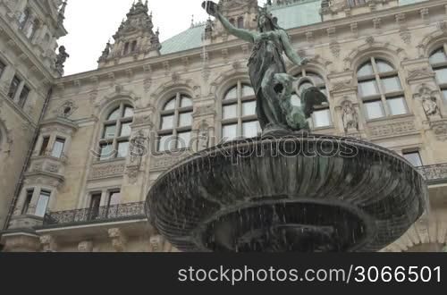 fountain near the rathaus in the center of the hamburg, germany.