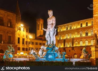 Fountain of Neptune by Bartolomeo Ammannati on Piazza della Signoria in Florence at night, Italy