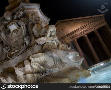 Fountain of Piazza Rotonda at night outside Pantheon in Rome, Italy