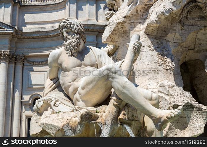 Fountain of the Four Rivers in Rome, Italy in a summer day