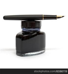 fountain pen lying on the ink bottle