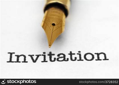 Fountain pen on invitation text