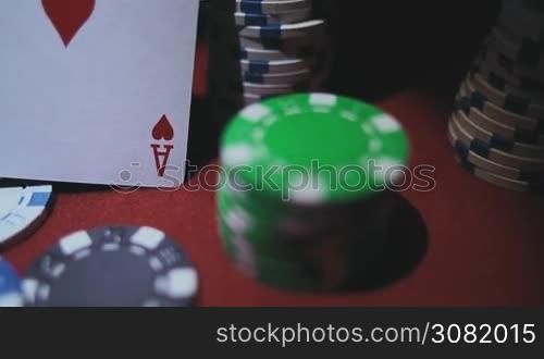 Four Aces On Poker Chips. Poker Table With Chips In Casino
