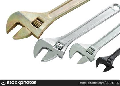 four adjustable wrenches of different sizes, isolated, clipping path