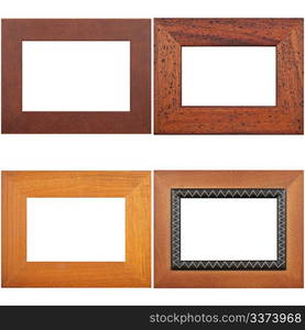 Four antique picture frames isolated on white background.