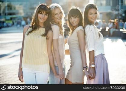 Four beautiful women in casual pose