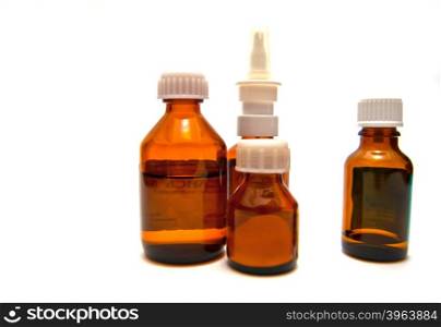 Four bottles of medicine on white background