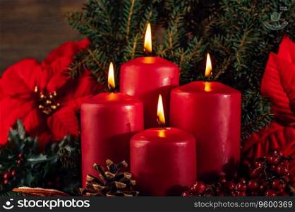 four burning Red advent candles in advent wreath decoration on wooden dark background. tradition in time before Christmas. xmas lights with christmas fir deco background concept. Festive still life.. Red candles in advent wreath decoration on wooden dark background