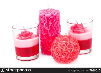 Four candles isolated on white background.