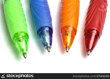 Four colour pens isolated on white background
