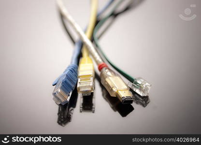 Four computer cables, close up