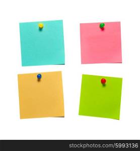 Four different color paper stickers with pins isolated on white background