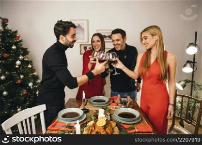 four friends dining christmas