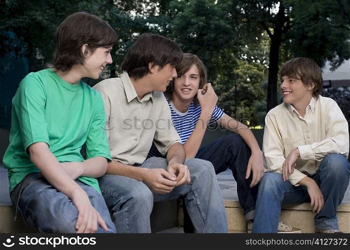 Four friends sitting together