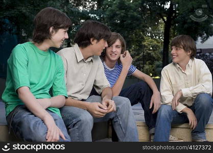 Four friends sitting together