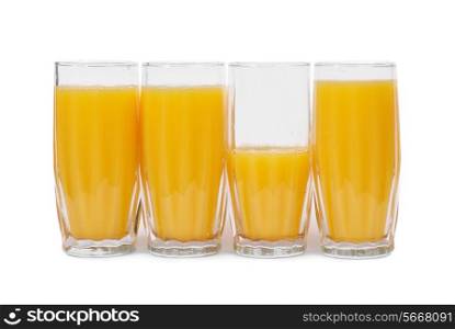 Four glasses with orange juice isolated on white