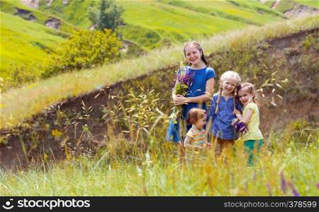 four little girl outdoors - summer