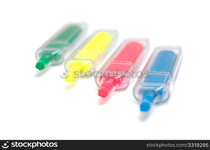 Four markers on a white background