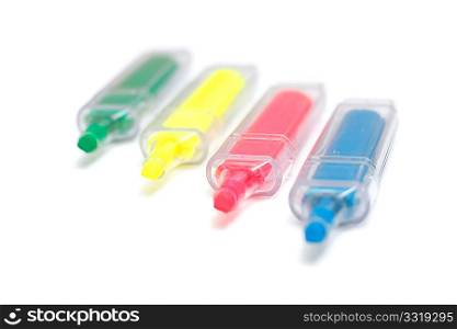 Four markers on a white background