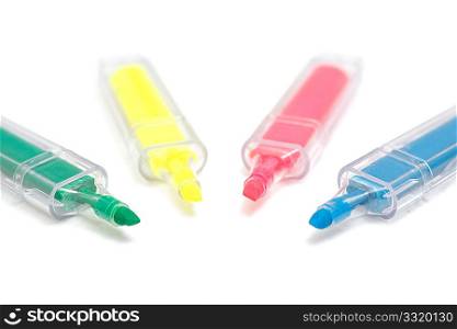 Four markers on a white background
