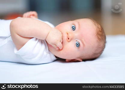 Four months old baby with blue eyes