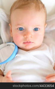 Four months old baby with blue eyes