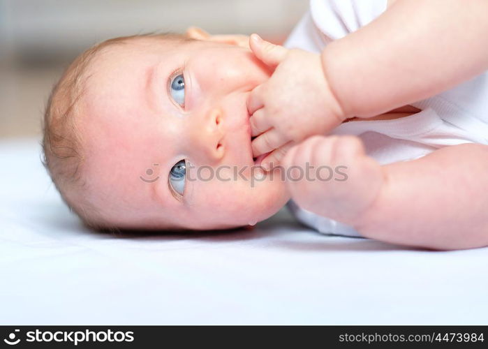 Four months old baby with blue eyes