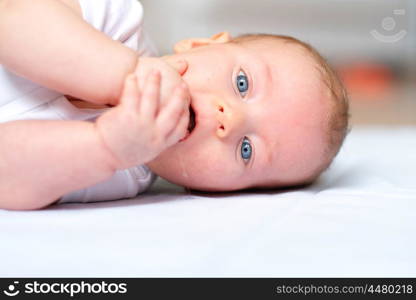 Four months old baby with blue eyes