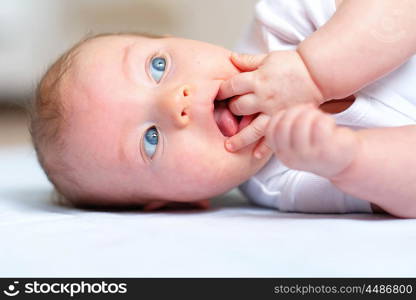 Four months old baby with blue eyes