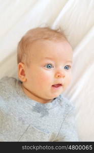 Four months old baby with blue eyes