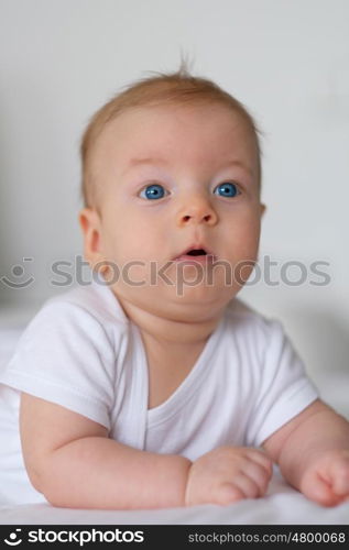 Four months old baby with blue eyes