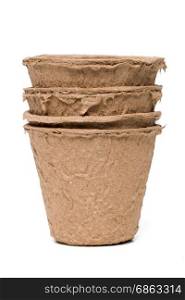 Four paper recycle pots on white background.