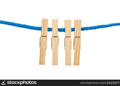 Four pegs hanging in a rope, white isolated background.