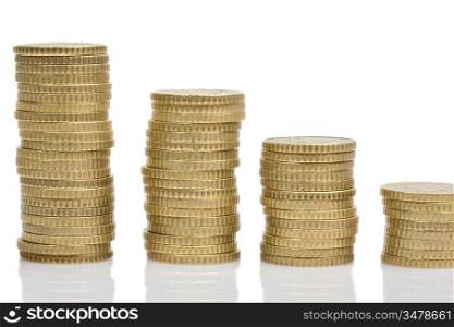 Four piles of money isolated on white