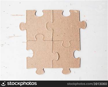 Four puzzle pieces close up