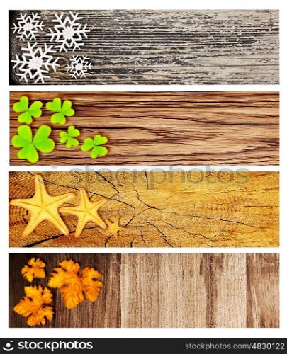 Four season wooden banners, collage of abstract natural backgrounds with seasonal symbols, life cycle concept