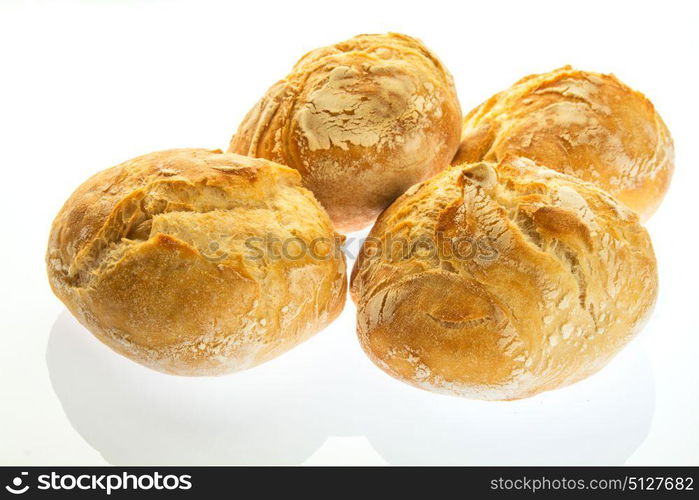 four small bread with round shape made on wood stove