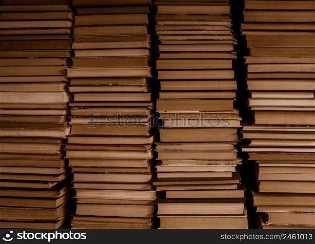 Four stacks of old books. Vintage styled background.. Four stacks of old books. Vintage background.